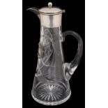An Edwardian silver mounted claret jug