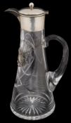 An Edwardian silver mounted claret jug