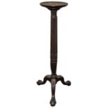 A George III style mahogany torchere