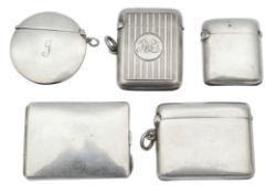 Four Edwardian silver vesta cases and a matchbook case