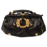 A Dolce and Gabbana Artisan Golden Cherub black leather bag