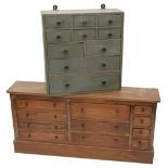 A pine table top bank of drawers and another