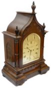 A Victorian Gothic walnut cased bracket clock