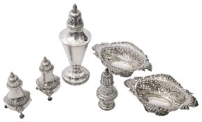 A pair of Edwardian silver pepper casters, a sugar caster and other silver