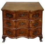 An 18th century South German crossbanded walnut serpetine chest