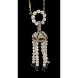 A delicate Art Deco diamond and pearl sautoir pendant drop