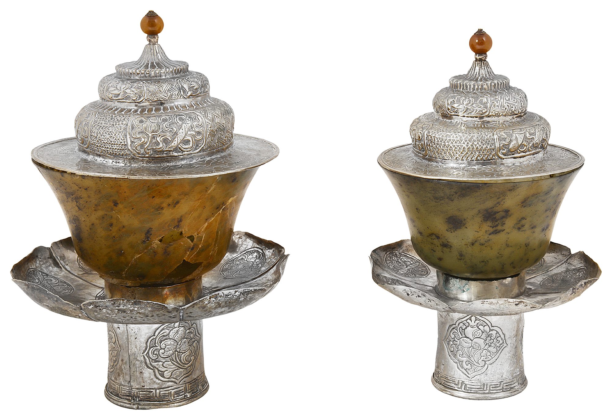 Two Tibetan nephrite jade and white metal stems bowls and covers c.1900