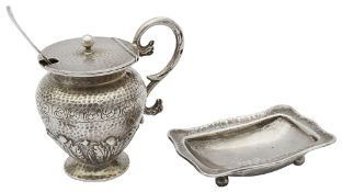 An Arts and Crafts silver mustard pot and a silver salt by Omar Ramsden
