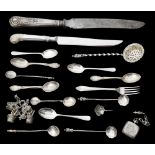 A selection of silver coffee spoons and other items