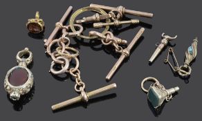 A collection of assorted watch keys and various findings