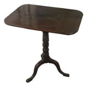 An early 19th century mahogany tripod table