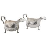 A pair of early George III silver sauce boats