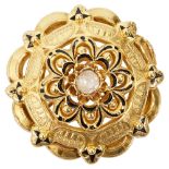 A mid Victorian yellow gold and black enamel brooch