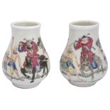 A pair of early 20th century Chinese famille rose vases