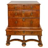A Queen Anne walnut chest on stand