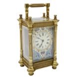 A late 19th century French gilt brass & champleve carriage clock