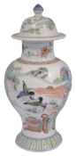A 19th century Chinese famille verte baluster vase and cover