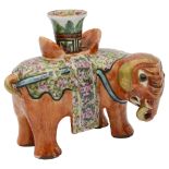 A 19th century Chinese famille rose elephant candle holder