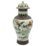 A late 19th or early 20th century Chinese famille verte lidded vase