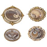 Four 19th century oval memorial locket brooches