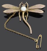 An Art Nouveau style 9ct gold opal set dragonfly brooch