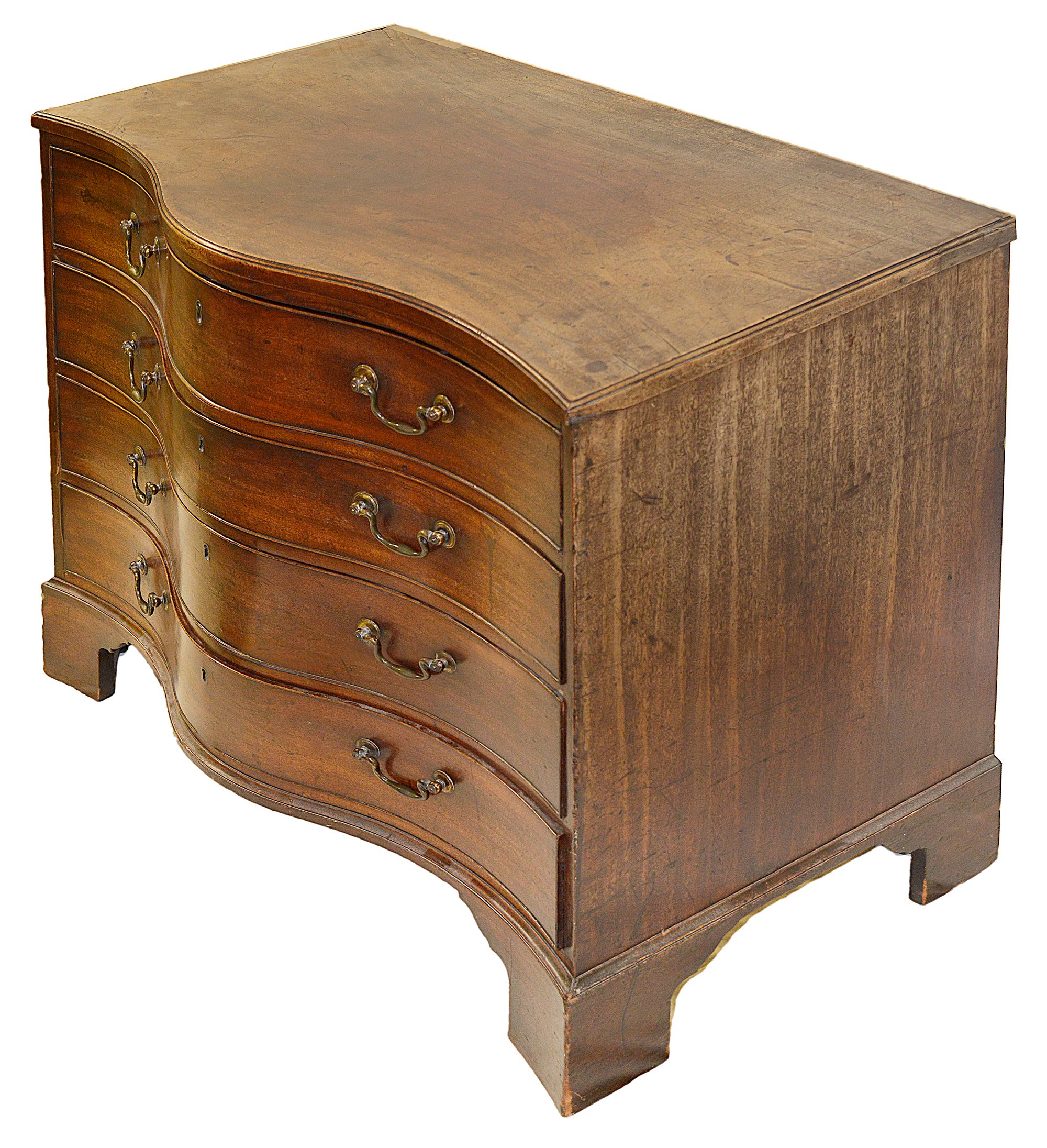 A George III mahogany serpentine chest of drawers - Image 2 of 25