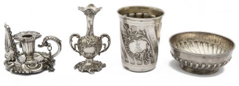 A Victorian silver taper chamber stick, a German .800 beaker, a continental bud vase, a small bowl