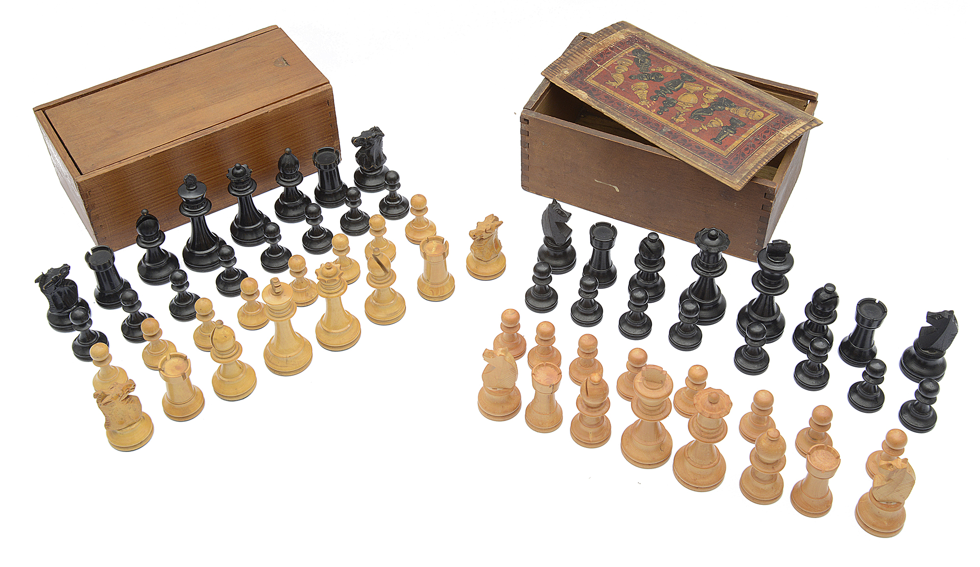 A late 19th century boxwood chess set and another