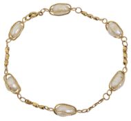 A cultured pearl link bracelet