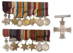 A George V military cross and two sets of WWI and WWII miniature medals