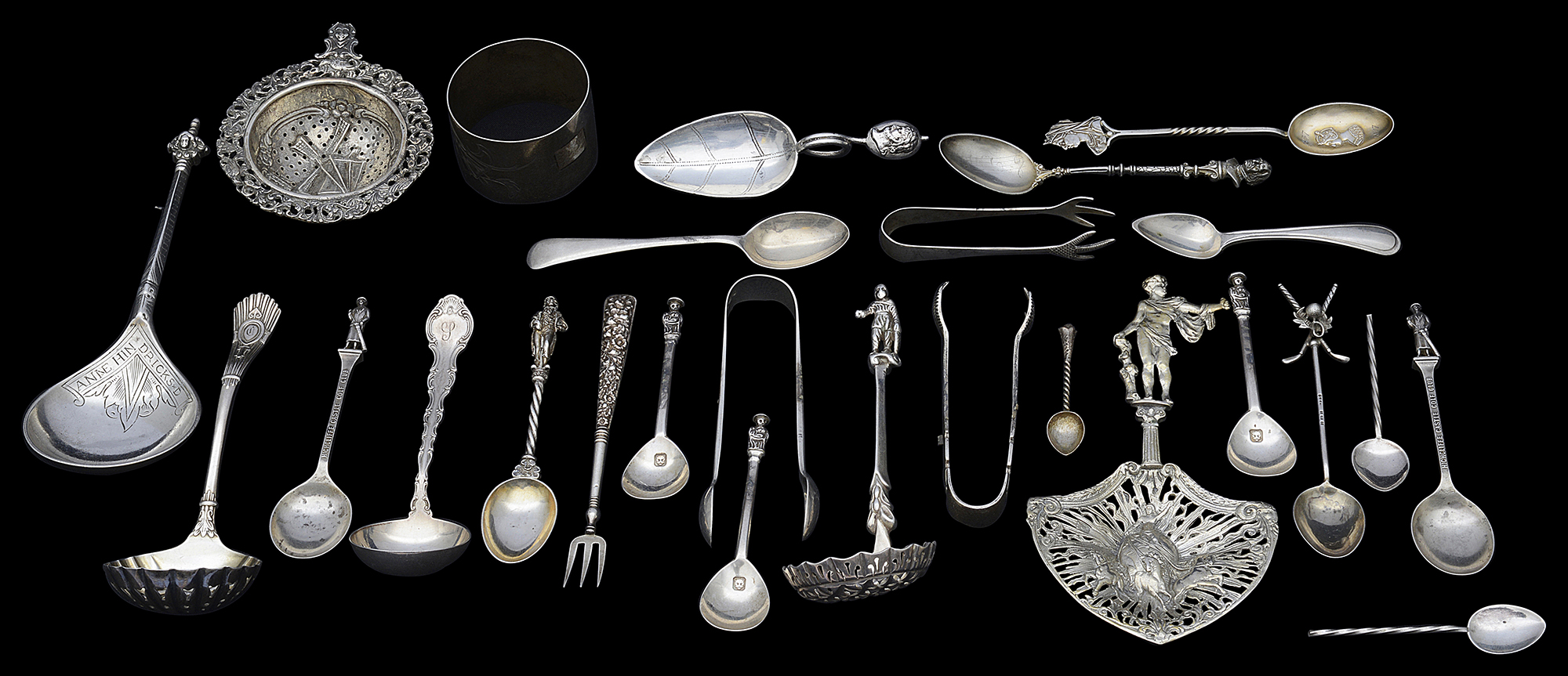 An assorted collection of 19th century and later silver spoons and sugar tongs