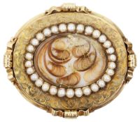 A mid Victorian yellow gold and half pearl memorial brooch