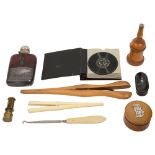 A 19th century treen boxwood glove powderer and other items