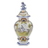 A 19th century French Rouen faience vase and cover