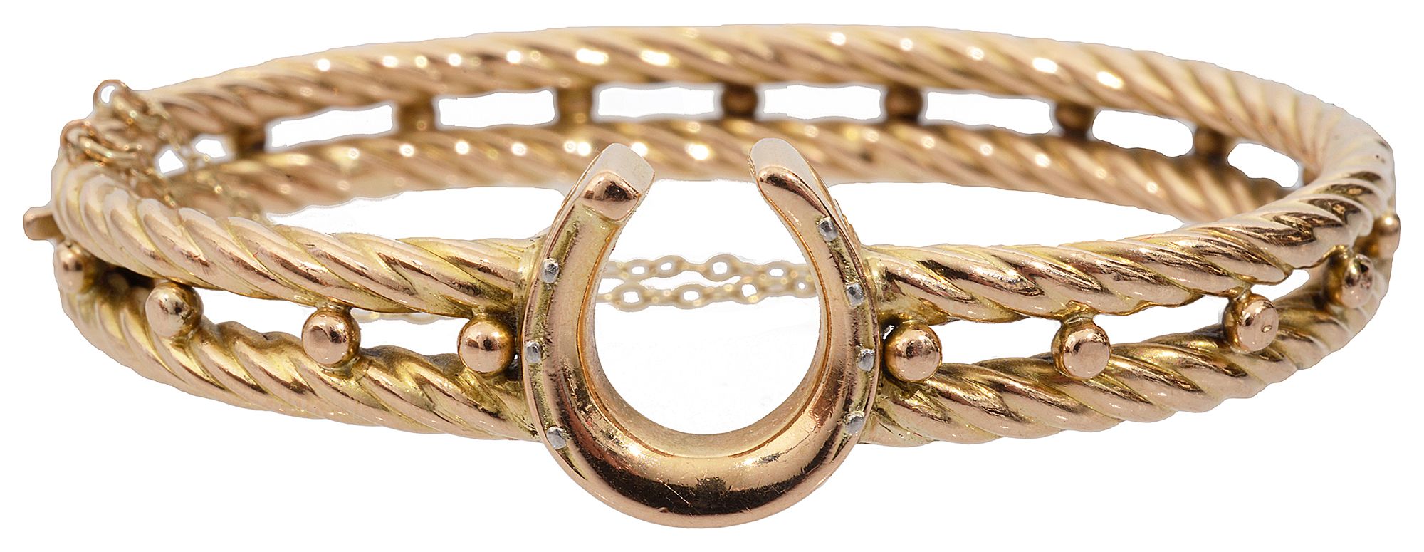 A late 19th century 15ct yellow gold hollow hinged bangle