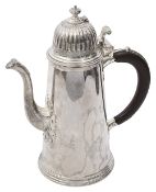A modern Britannia silver chocolate pot in Queen Anne Style