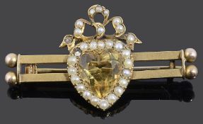 A Victorian citrine and seed pearl ribbon heart set bar brooch