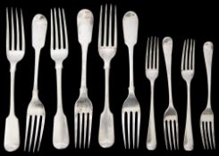 A matched set of six mostly William IV silver fiddle pattern table forks