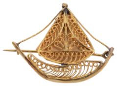 An Arabic yellow metal sailing vessel brooch