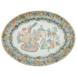 A 19th century famille rose oval dish painted with scholars