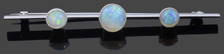 A large Art Deco three stone opal set bar brooch