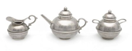 A late Victorian silver miniature three piece tea service