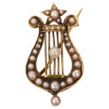 A late Victorian yellow gold and pearl brooch modelled as a classical lyre