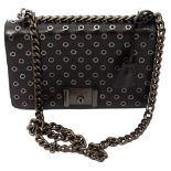 A Prada black leather grommet flap shoulder bag