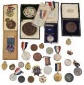 A collection of George V coronation and Silver Jubilee medals