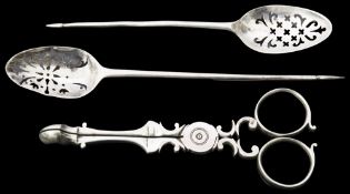 Two George III silver mote spoons and pair of scissor action sugar nips