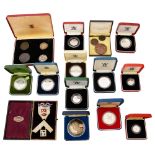 A cased Masonic silver jewel and a selection silver proof and other coins