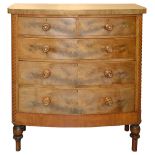 An early 19th century mahogany bow fronted chest of drawers