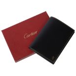 A Cartier black leather cased passport holder