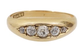 A diamond five stone ring